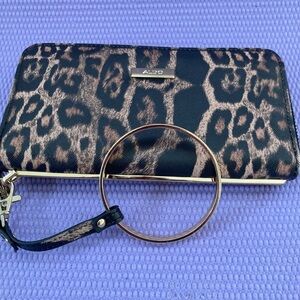 Cheetah Print 
ALDO Animal Print wallet With Detachable Strap Gold Colored ring